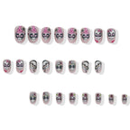 24 Pcs Halloween Press on Nails Short Almond Fake Nail with Cute Skull Flower and heart Designs Full Cover Pink Acrylic Nails Matte Halloween Stick on Nail for Women Nail Manicure Decoration