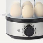 Amazon Basics Electric Egg Cooker for Hard-Boiled Eggs with Auto Shutoff, Dishwasher-Safe Parts, 7-Egg Capacity, BPA Free, Black