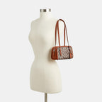 COACH Swing Zip 20