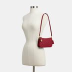 Coach Women's Patent Signature Leather Penn