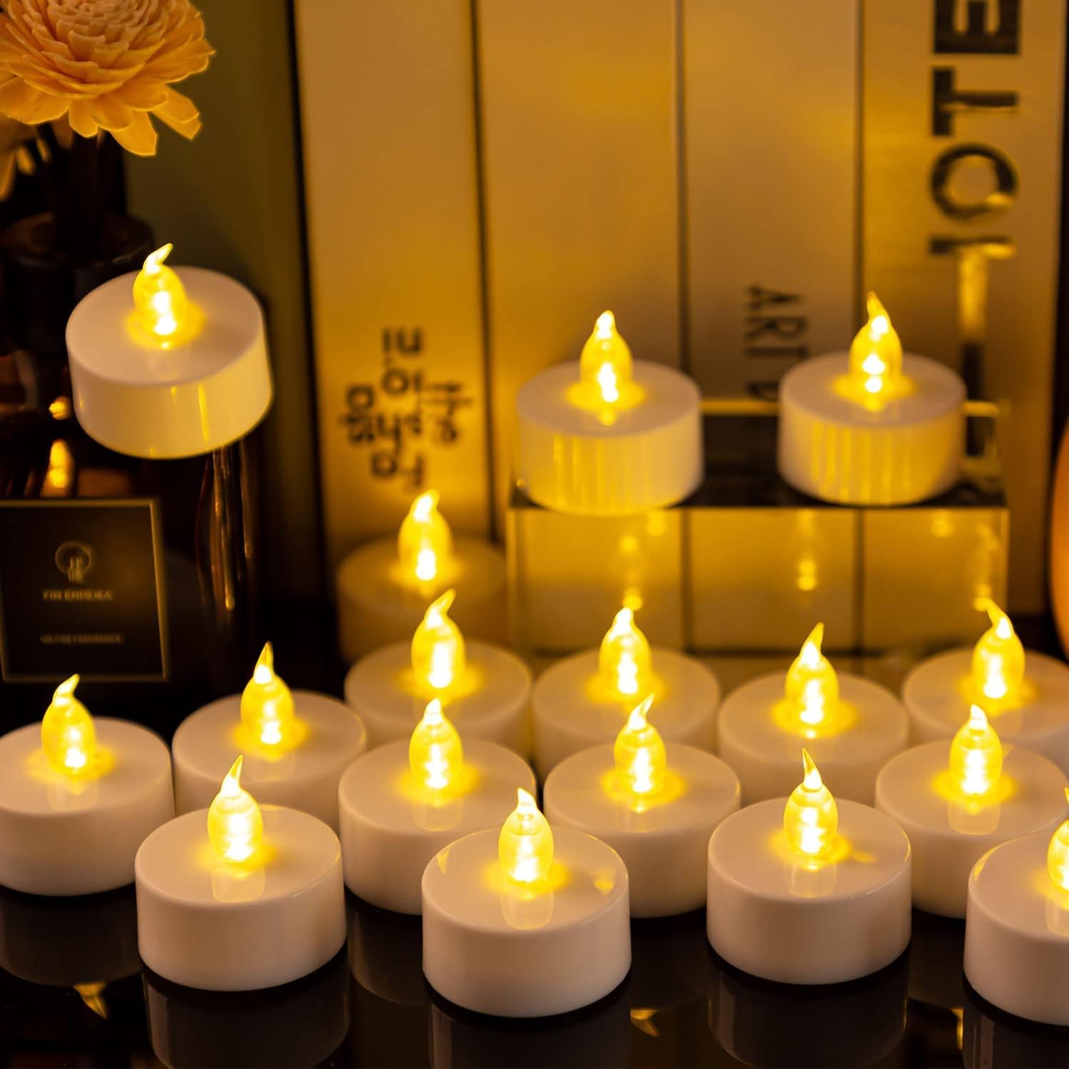 Nancia 100Pack Flameless Led Tea Lights Candles, Realistic And Bright Flickering Long Lasting 200Hours Battery-Powered, Ideal Party, Wedding, Birthday, Gifts Home Decoration Warm Yellow
