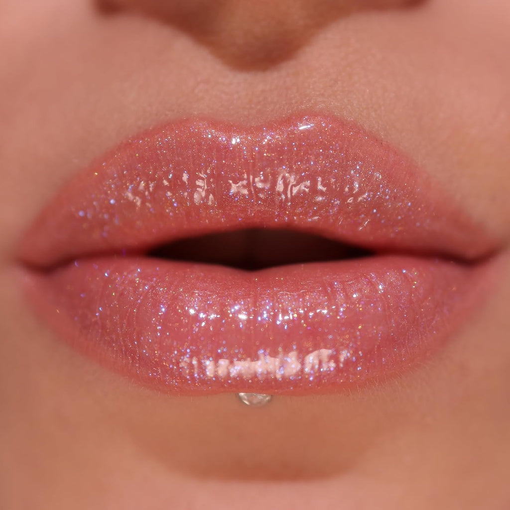 Revolution, Pout Bomb Shimmer Lip Gloss, Buildable Sheer Color, High-Shine with Hyaluronic Acid & Sweet Vanilla Scent, Vegan & Cruelty-Free, Glimmer Nude, 0.15 oz
