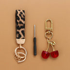 Angyape Cherry Keychain Wristlet Leather Car Keychain for Women Cute Purse Bag Charms Key Fob Holder with Keyrings Gifts