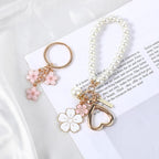 Piriuuo 2 Pcs Cute Pearl Keychains for Women, Flower Keychain Kit Imitation Pearl Chain Key Chain Golden Car Key Chain Flower Keychain Charm for Girls Purse Bag Accessories