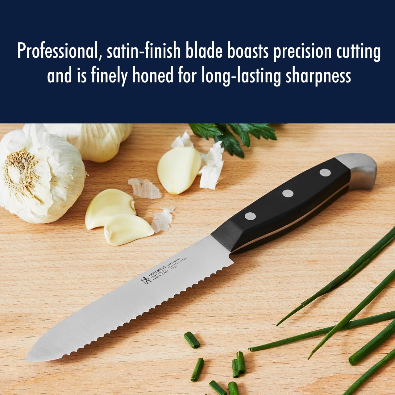HENCKELS Statement Razor-Sharp 5-inch Serrated Utility Knife, Tomato Knife, German Engineered Informed by 100+ Years of Mastery, Black/Stainless Steel