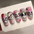 24 Pcs Halloween Press on Nails Short Almond Fake Nail with Cute Skull Flower and heart Designs Full Cover Pink Acrylic Nails Matte Halloween Stick on Nail for Women Nail Manicure Decoration