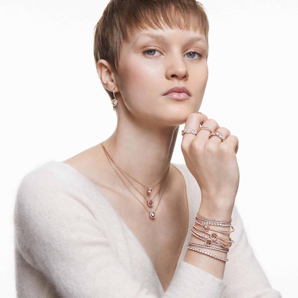 SWAROVSKI Una Pierced Drop Earrings with Dancing Crystal and Matching Pavé on a Rose-Gold Tone Finish Setting, Part of the Swarovski Una Collection