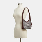 Coach Curve Zip Bag in Signature Jacquard