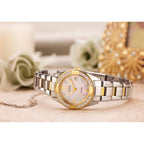 Citizen Women's Eco-Drive Dress Classic Diamond Watch in Two-Tone Stainless Steel, Mother of Pearl Dial (Model: EW1824-57D)