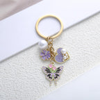 Butterfly Bag Charm Keychain for Women, Cute Flower Heart Metal Enamel Key Holder Pearl Pendant Purse Keyring