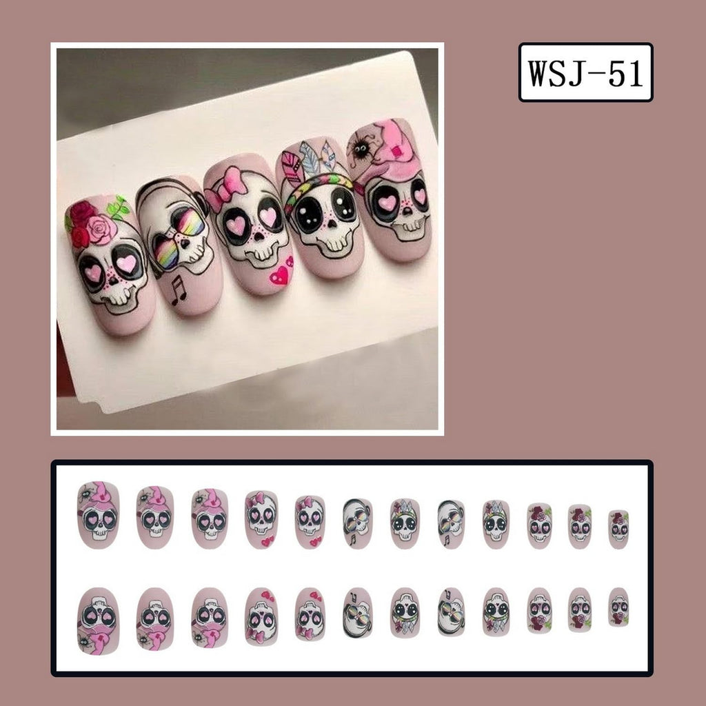 24 Pcs Halloween Press on Nails Short Almond Fake Nail with Cute Skull Flower and heart Designs Full Cover Pink Acrylic Nails Matte Halloween Stick on Nail for Women Nail Manicure Decoration