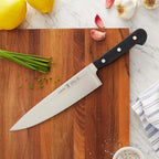 Henckels Classic 8-Inch Chef Knife, Razor-Sharp, German Engineered | Fully Forged Construction Provides Balance With Traditional Triple-Rivet Handles Enables Comfortable Easy Cutting.