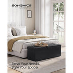 Songmics Mazie Collection - 43 Inches Folding Storage Ottoman Bench, Ottoman With Storage, Foot Rest Stool, Load 660 Lb, For Living Room, Synthetic Leather, Black Ulsf701