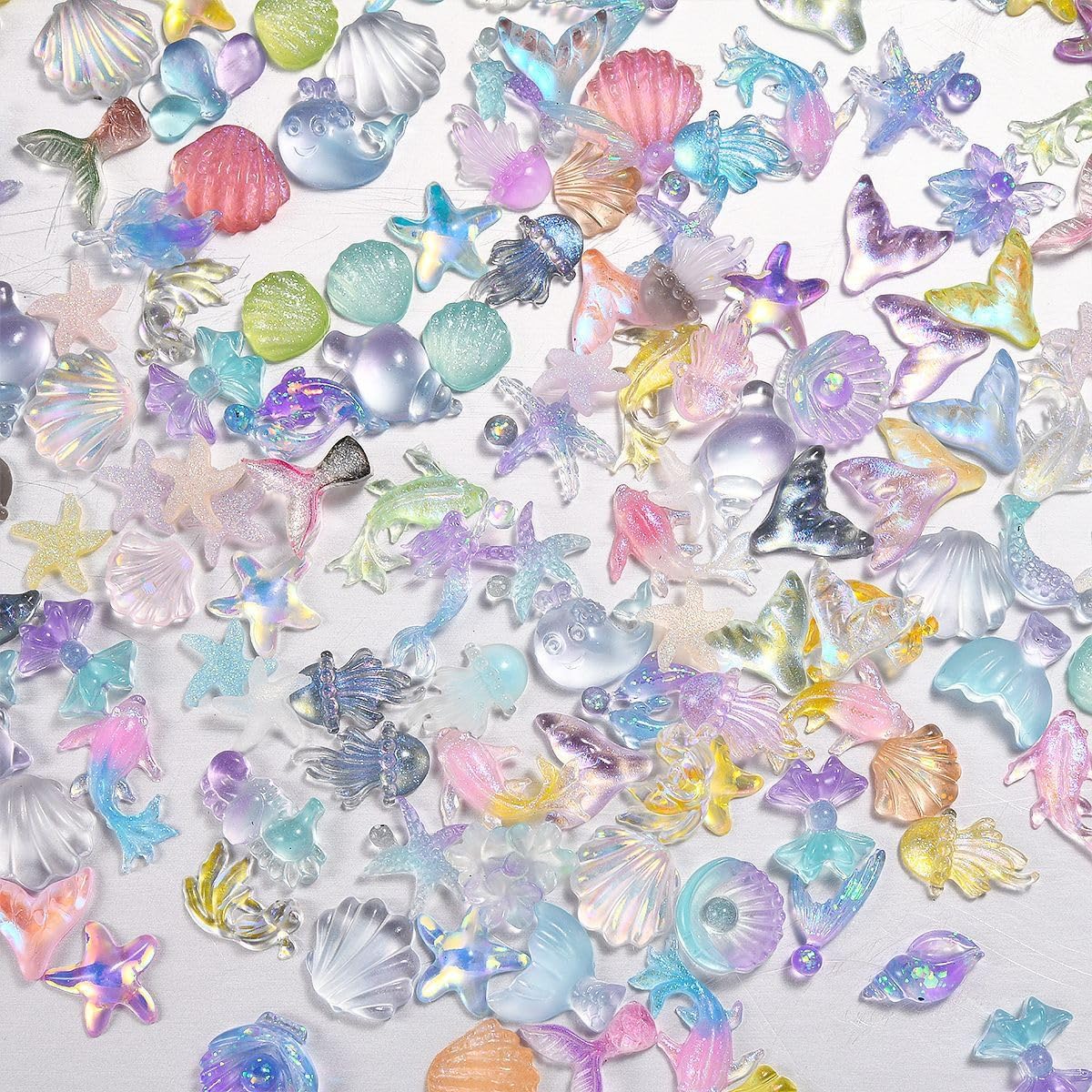 100Pcs Ocean Series Nails Charms 3D Colorful Seashell Jellyfish Starfish Nail Rhinestones Resin Summer Flat Nail Art Supplies for Acrylic Nails Dolphin Mermaid Nail Charms for Women Summer DIY