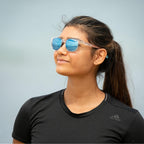 Tifosi Swank Sport Sunglasses - Tangle Free - Ideal For Cycling, Golf, Hiking, Pickleball, Running and Great Lifestyle Look Smoke With Bright Blue Mirror