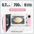Nostalgia Retro Microwave Oven - 0.7 Cu Ft, 700-Watt Countertop Size With Glass Turntable, Child Safety Lock, 8 Auto-Cook Programs, Digital Clock - Pink