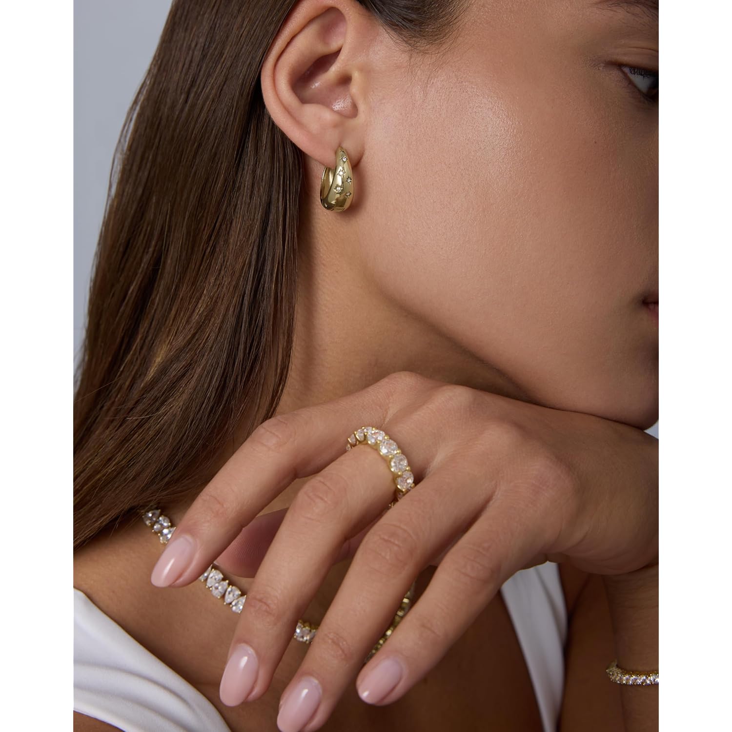 PAVOI Waterproof Gold Hoop Earrings for Women - 14K Gold Plated Chunky Huggie Hoop Earrings with Cubic Zirconia Starburst - Stainless Steel Trendy Summer Fashion Jewelry