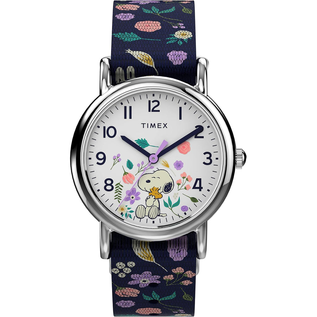 Timex Womens Watch Peanuts Weekender Casual Ladies Wristwatch - Featuring Snoopy and Woodstock in a Floral Motif, Silver-Tone Case with Blue Fabric Strap (31mm)