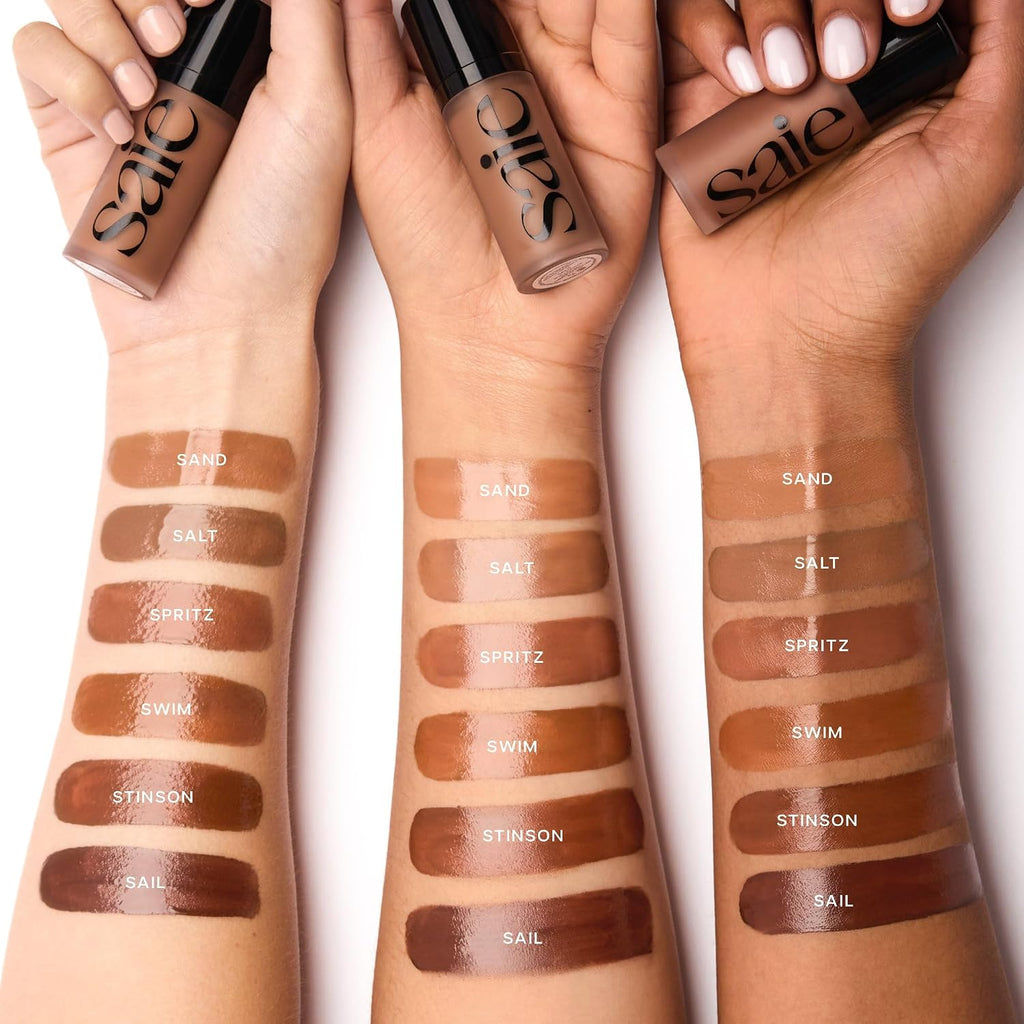 Saie Dew Bronze - Hydrating Liquid Bronzer Stick For A Sun Kissed Glow - Liquid Contour Stick Infused With Nourishing Skin Care Ingredients - Sculpted Face Makeup Essential - Sand (0.4 Oz)