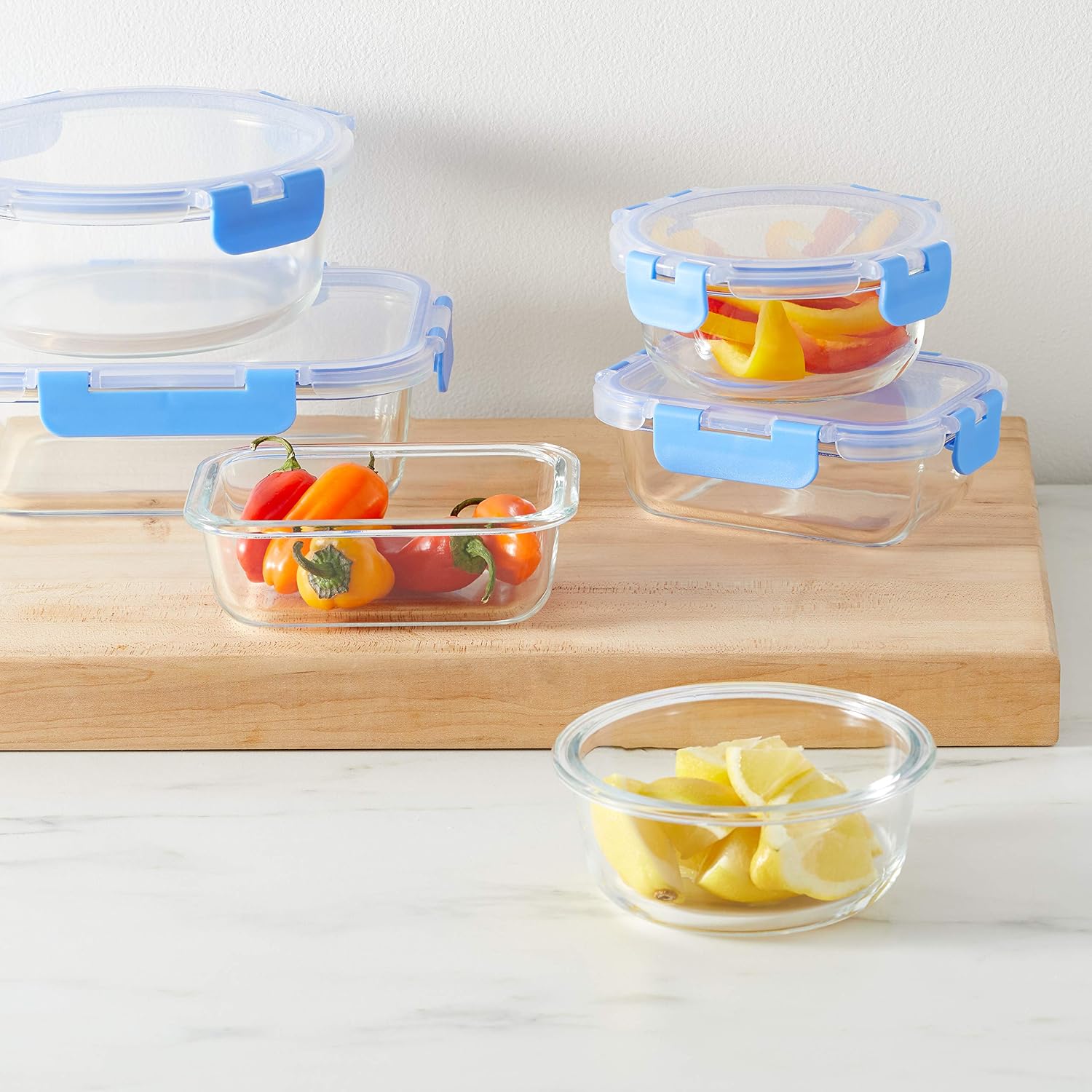Amazon Basics Glass Food Storage Containers, Leak Proof, Oven Safe, Easy To Clean, Stain Resistant, Set Of 7, 14 Pieces Including Lids, Bpa-Free, Clear With Blue Silicone Ring